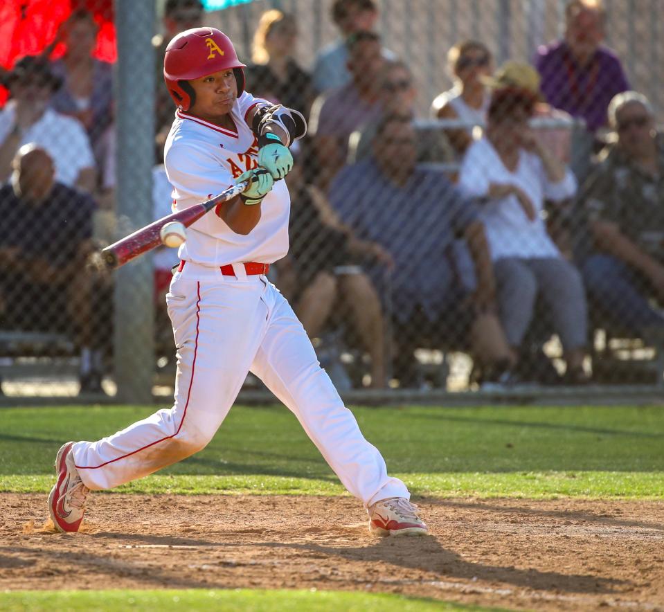 Palm Desert's Nicholas Chavez (20) connects for a hit during their second round CIF-SS Division 4 game in Palm Desert, Calif., Tuesday, May 7, 2024.