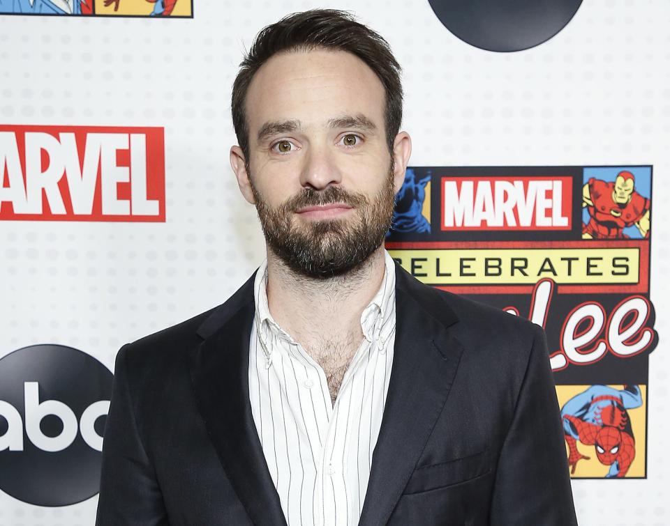 a portrait of charlie at a red carpet for marvel and abc