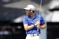 Matthew Wolff reacts after missing a birdie on the 11th green during the third round of the Rocket Mortgage Classic golf tournament, Saturday, July 4, 2020, at the Detroit Golf Club in Detroit. (AP Photo/Carlos Osorio)