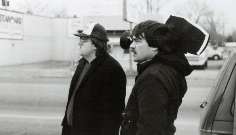 Michael Moore, left, and John Prusak at work on the 1989 documentary "Roger & Me."