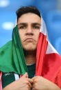 <p>A Mexico fan looks dejected following his sides defeat in the 2018 FIFA World Cup Russia Round of 16 match between Brazil and Mexico at Samara Arena on July 2, 2018 in Samara, Russia. (Photo by Matthias Hangst/Getty Images) </p>