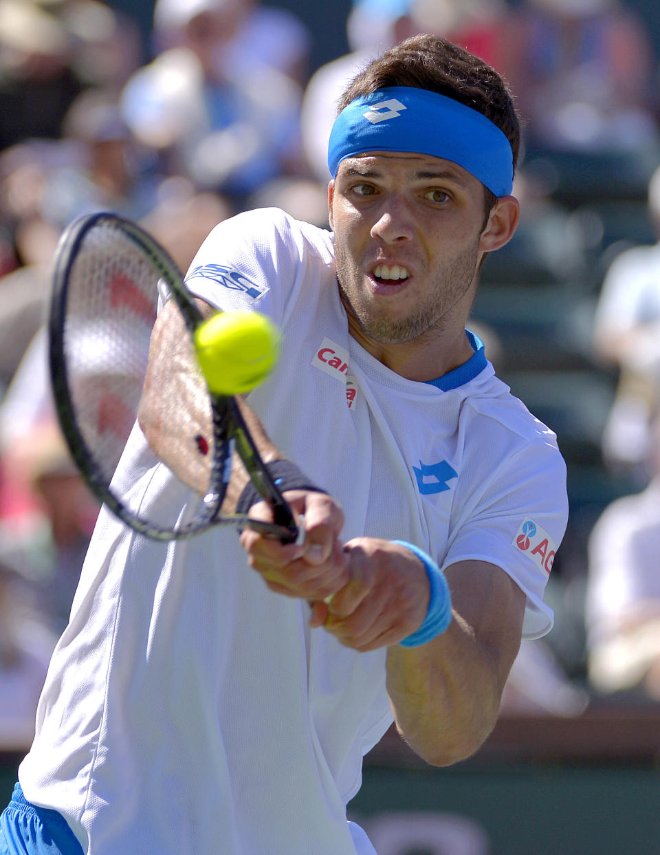 Jiri Vesely, of Czech Republic, returns a volley from Andy Murray, of Great Britain, during a third round match at the BNP Paribas Open tennis tournament, Monday, March 10, 2014, in Indian Wells, Calif. (AP Photo/Mark J. Terrill)