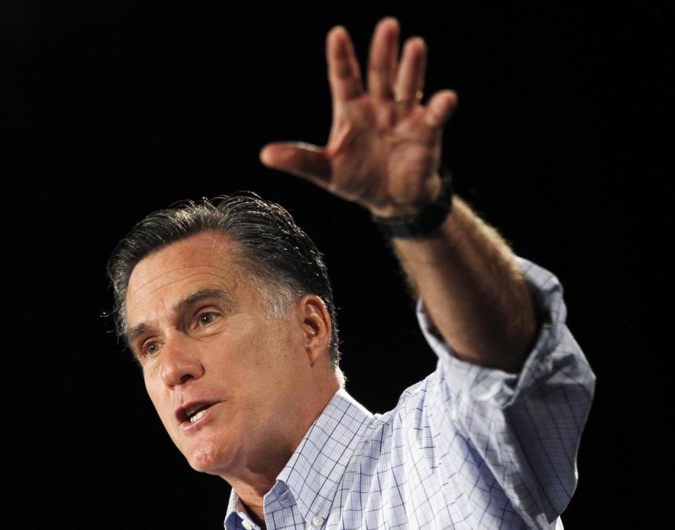 In this photo taken Aug. 8, 2012, Republican presidential candidate, former Massachusetts Gov. Mitt Romney campaigns in Des Moines, Iowa. Welfare is causing a ruckus in the presidential campaign, but the program is a shadow of its old self in the 1970s, when Ronald Reagan used the image of “welfare queens” against government poverty programs promoted by liberals. (AP Photo/Charles Dharapak)