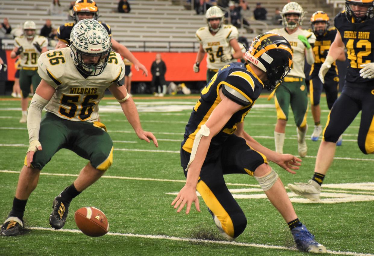 Adirondack Wildcat Giovanni Foster (56) eyes a loose ball during the fourth quarter of Section III's Class C championship game against General Brown Sunday in the JMA Wireless Dome.