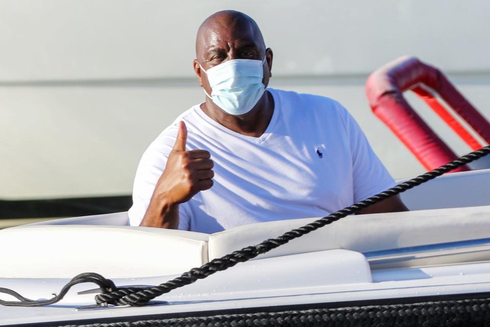 <p>Magic Johnson gives a thumbs up while boarding a boat on Tuesday in Saint Tropez, France. </p>