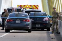 Greenpeace USA climbers form a blockade on the Fred Hartman Bridge, near Baytown