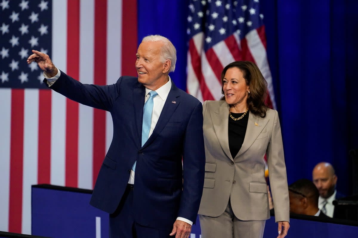 U.S. President Joe Biden and Vice President Kamala Harris walk out together at an event on Medicare drug price negotiations on August 15 (REUTERS)