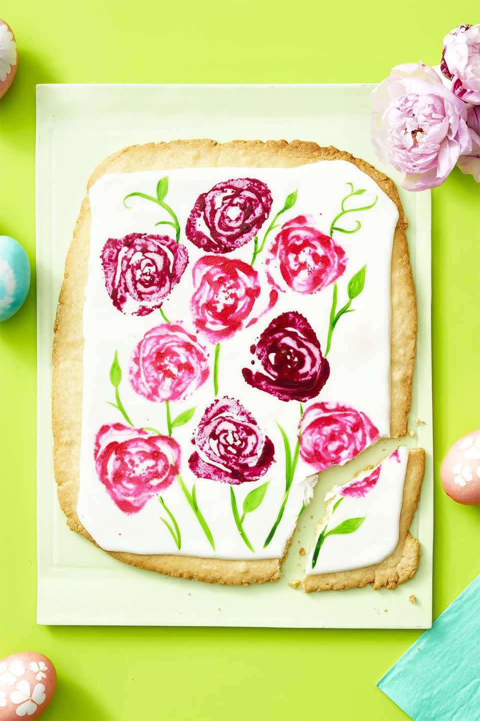 <p>Who needs a floral centerpiece when you have this giant cookie displayed on your Easter brunch table?</p><p>Get the <strong><a href="https://www.womansday.com/food-recipes/a35681467/giant-sugar-cookie-bouquet-recipe/" rel="nofollow noopener" target="_blank" data-ylk="slk:Giant Sugar Cookie Bouquet recipe.;elm:context_link;itc:0;sec:content-canvas" class="link ">Giant Sugar Cookie Bouquet recipe.</a></strong></p>