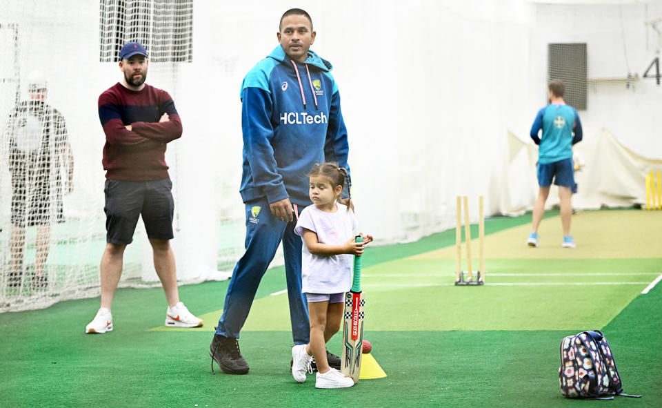 Usman Khawaja, pictured here with his daughter on Christmas Day at the MCG.