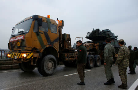 A Turkish military convoy arrives at an army base in the border town of Reyhanli near the Turkish-Syrian border in Hatay province, Turkey January 17, 2018. REUTERS/Osman Orsal