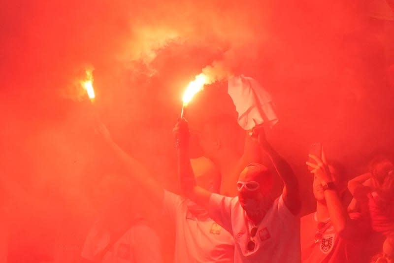 Polish fans set off pyrotechnics in the stands before the UEFA Euro 2024 Group D soccer match between Poland and Austria at the Olympiastadion. Michael Kappeler/dpa
