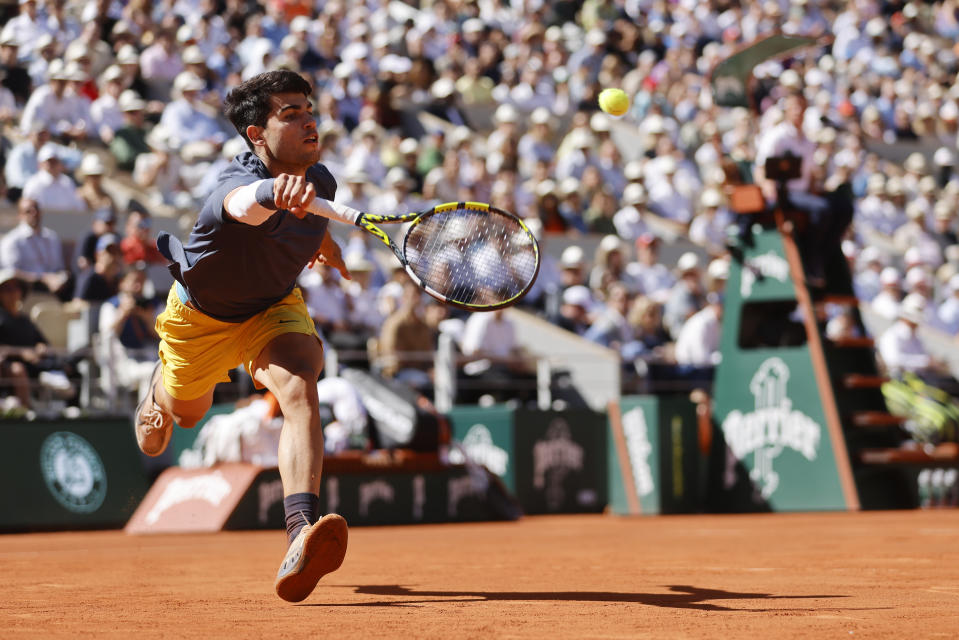 Spain's Carlos Alcaraz plays a shot against Italy's Jannik Sinner during their semifinal match of the French Open tennis tournament at the Roland Garros stadium in Paris, Friday, June 7, 2024. (AP Photo/Jean-Francois Badias)