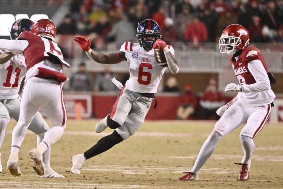 Mississippi running back Zach Evans (6) finds a running lane against Arkansas.