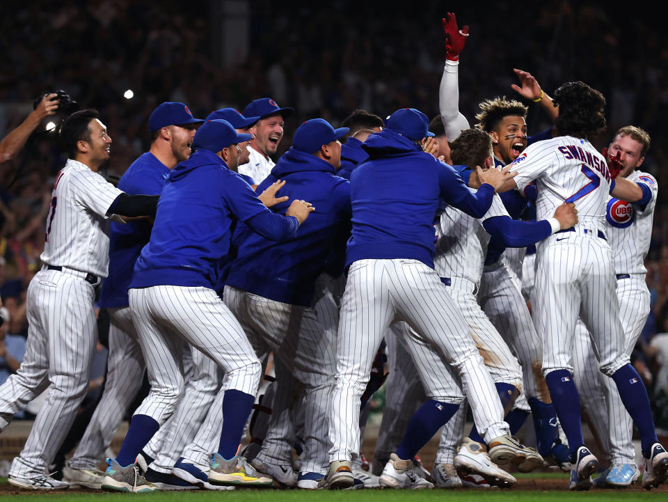 Chicago Cubs designated hitter Christopher Morel, third from right, celebrates with teammates after hitting a walk-off, three-run home run in the ninth inning against the Chicago White Sox on Wednesday, Aug. 16, 2023, at Wrigley Field, in Chicago. (Chris Sweda/Chicago Tribune/Tribune News Service via Getty Images)