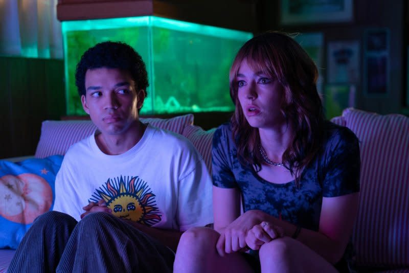 Owen (Justice Smith) and Maddy (Brigette Lundy-Paine) watch "The Pink Opaque." Photo courtesy of A24