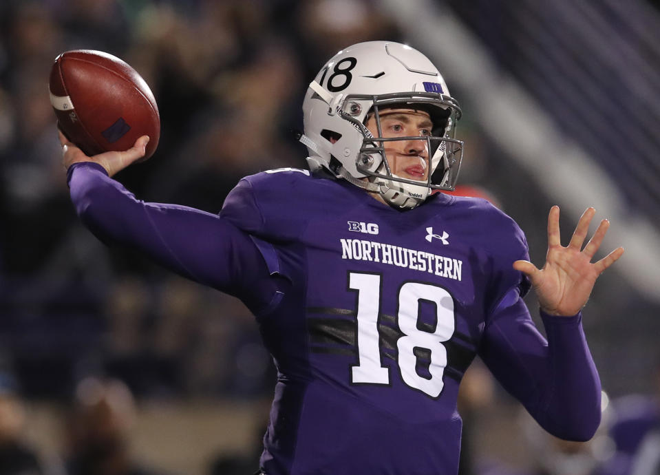 Northwestern's Clayton Thorson makes a pass against Notre Dame during the first half of an NCAA college football game Saturday, Nov. 3, 2018, in Evanston, Ill. (AP Photo/Jim Young)