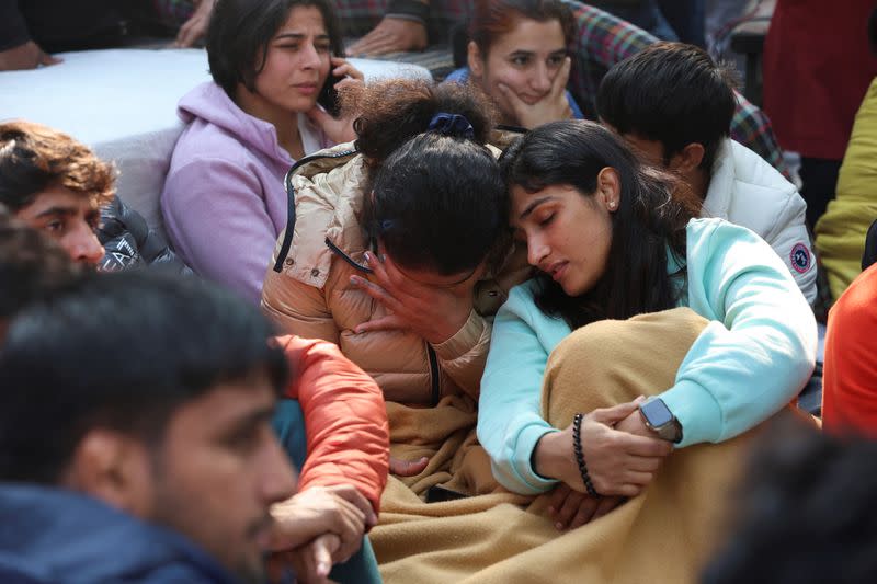 FILE PHOTO: Sakshi Malik and other Indian wrestlers take part in a protest demanding the disbandment of the WFI and the investigation of its head by the police, who they accuse of sexually harassing female players, at Jantar Mantar in New Delhi