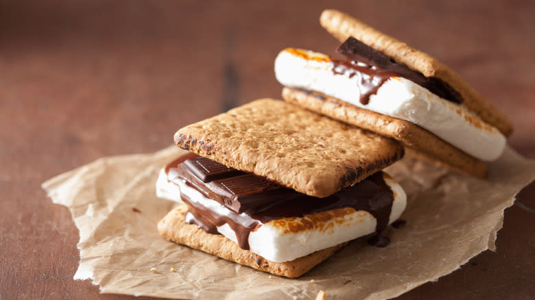 Stacked s'mores on parchment paper 