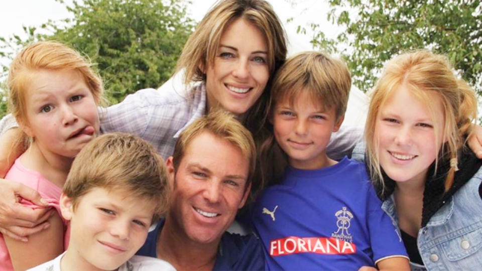 Liz Hurley is pictured here with Shane Warne and their kids when the pair used to date one another. 