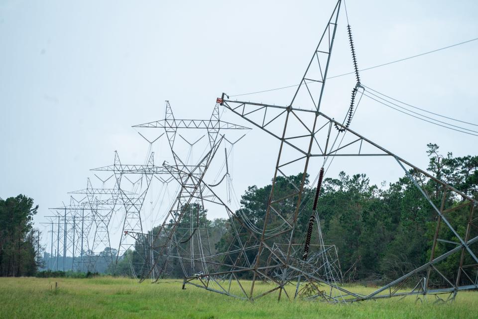 Hurricane Laura's high winds wreaked havoc on these transmission towers and big kilovolt lines in Moss Point, Louisiana. The repairs to the area's power infrastructure will take week.