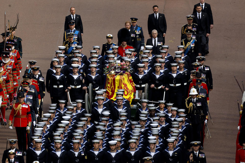 Queen Elizabeth II's funeral cortege borne on the State Gun Carriage of the Royal Navy travels along The Mall in London, Monday, Sept. 19, 2022. (Chip Somodevilla/Pool Photo via AP)