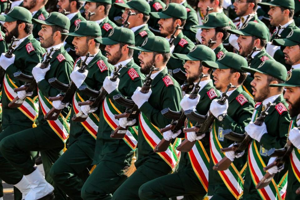 Members of Iran's Revolutionary Guards Corps march prior to the attack (AFP/Getty Images)