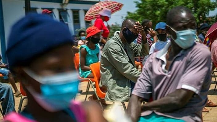 Residents wait for their COVID-19 vaccinations in Lawley, South Africa, for the launch of the Vooma vaccination program on Friday. South Africa has pushed up its vaccination campaign a week after it discovered coronavirus’ new omicron variant. (Photo: Jerome Delay/AP)
