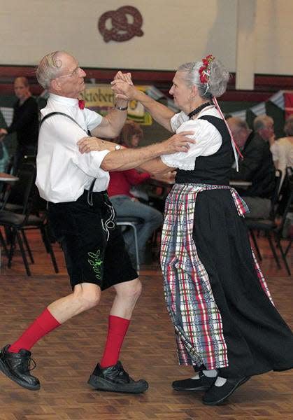 A couple dances at the annual Oktoberfest celebration at Loves Park City Hall. RRSTAR.COM FILE PHOTO