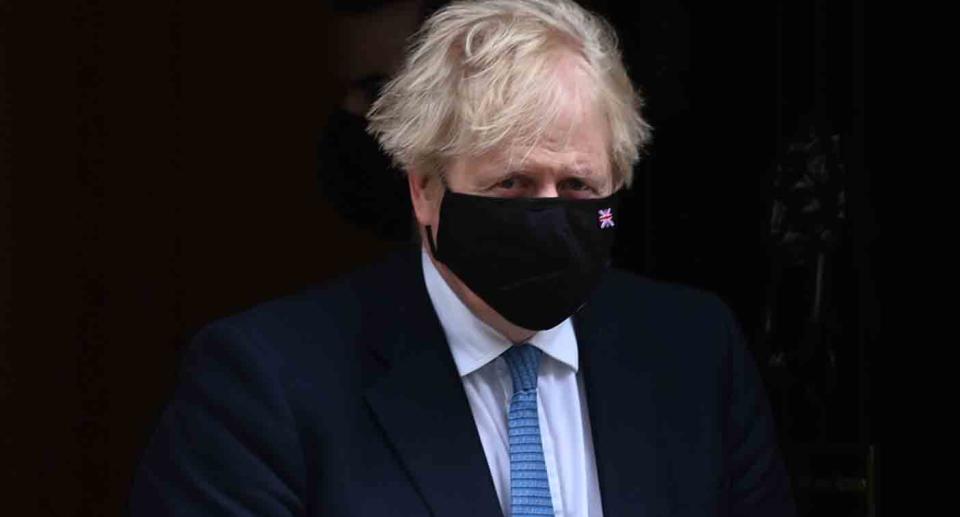 UK Prime Minister Boris Johnson wearing a face mask.