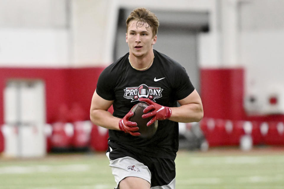 FILE - Arkansas linebacker Drew Sanders runs drills during NFL football pro day March 29, 2023, in Fayetteville, Ark. The Denver Broncos added a deep threat for Russell Wilson in Oklahoma wide receiver Marvin Mims Jr. and bolstered their linebacking corps with Sanders on Day 2 of the NFL draft Friday, April 28, 2023. (AP Photo/Michael Woods, File)