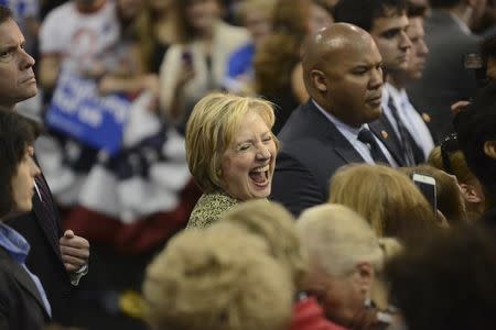 Democratic U.S. presidential candidate Hillary Clinton reacts during a campaign event at Carnegie Mellon University in Pittsburgh, Pennsylvania April 6, 2016. REUTERS/Alan Freed