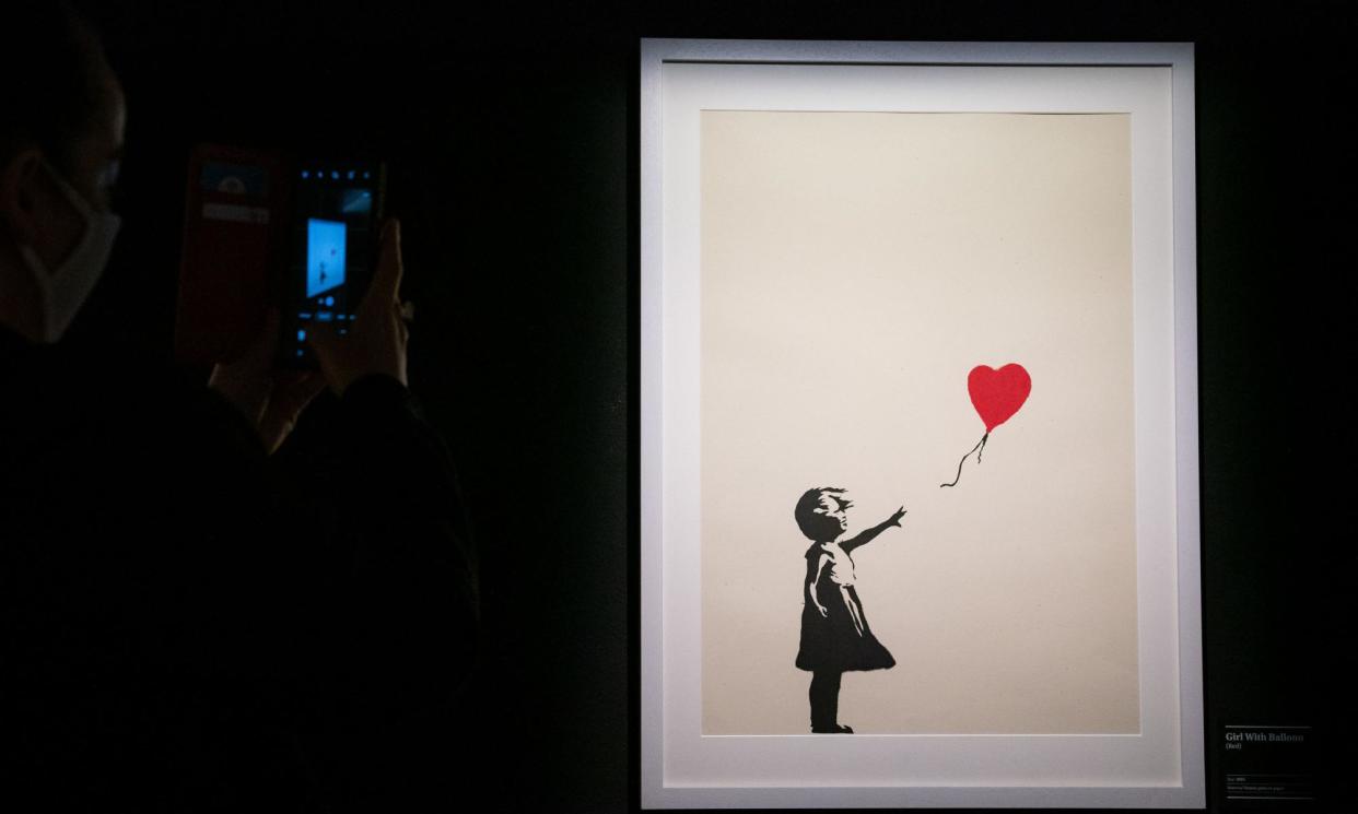 <span>Banksy’s Girl With Balloon on display at the Art of Banksy exhibition at 50 Earlham Street, London.</span><span>Photograph: Aaron Chown/PA</span>