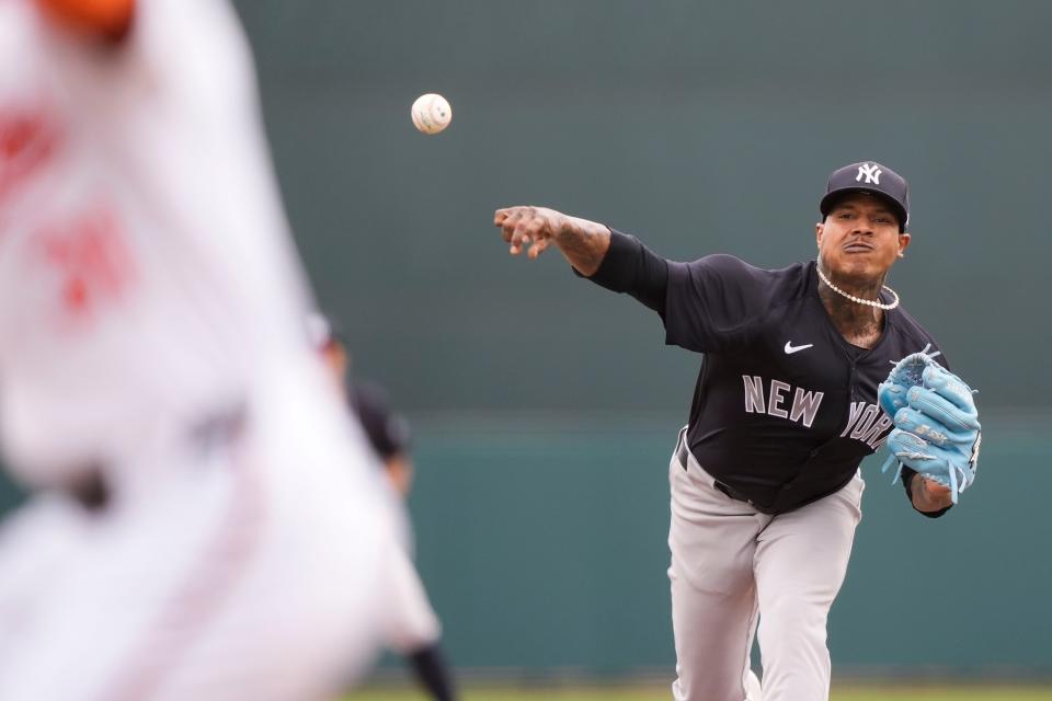 New York Yankees starting pitcher Marcus Stroman throws in the first inning of a spring training game against the Baltimore Orioles in Sarasota, Fla., Saturday, March 2, 2024. (AP Photo/Gerald Herbert)
