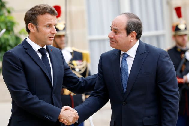 French President Emmanuel Macron shakes hands with Egyptian President Abdel Fattah al-Sisi (R) upon his arrival at the Elysee Palace in Paris on July 22, 2022. (Photo: Antoine Gyori - Corbis via Getty Images)