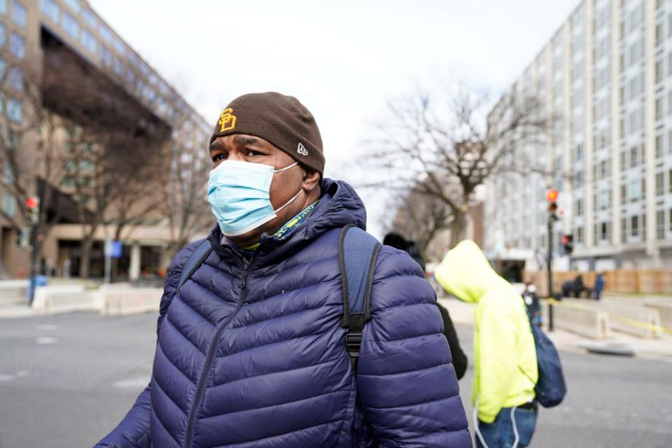 Ira Turner, 53, of New York City, walks past the Capitol building during Martin Luther King Day on Jan. 18, 2021 in Washington, D.C.