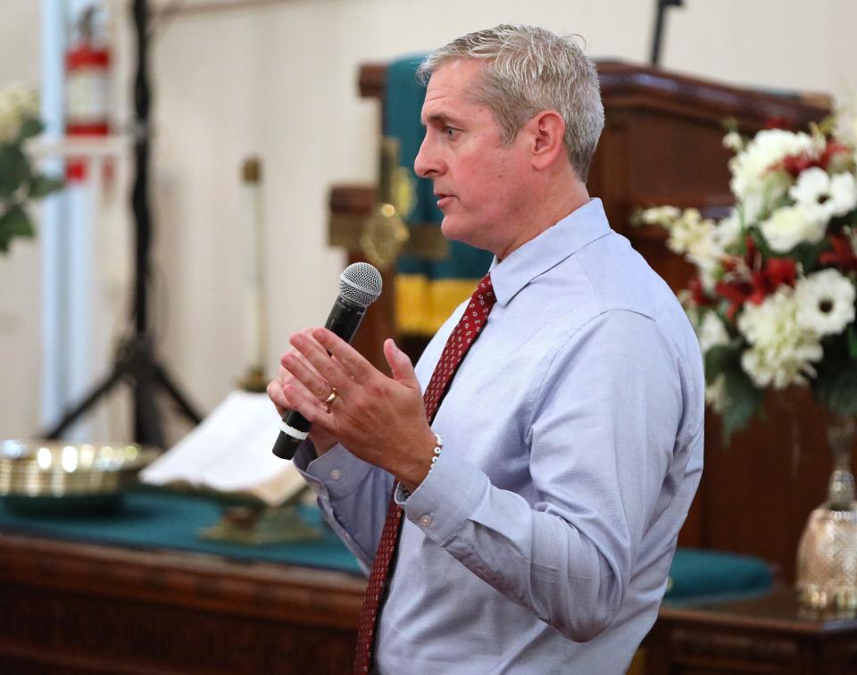 Tony Cunningham, the general manager of GRU, answers questions from citizens during a town hall style meeting organized by city commissioner Cynthia Chestnut in response to several community hot button issues, the event was held at Mt. Pleasant Mission Baptist Church in Gainesville FL. August 8, 2022. Topics at the town hall included the exclusionary zoning, high GRU bills and more.