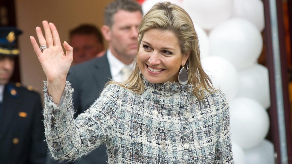 Royal Highness Queen Maxima waving to the public after she and her husband just opened the 'koningsspelen' on a school, April 26, 2013 in the Netherlands.