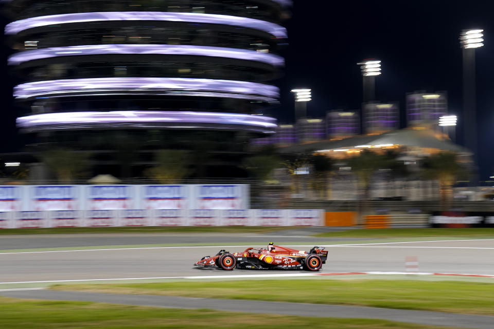 Ferrari driver Carlos Sainz of Spain steers his car during the Formula One Bahrain Grand Prix at the Bahrain International Circuit in Sakhir, Bahrain, Saturday, March 2, 2024. (AP Photo/Darko Bandic)