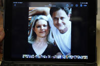 Andrea Breedlove, a resident of the Carpenter community near Crystal Springs, Miss., has among the photographs of stored on her tablet, a 2014 photograph of herself and her late son Chase Brewer, who was shot and killed by U.S. Drug Enforcement Administration Agent Harold Duane Poole with his semiautomatic service rifle on April 27, 2021. Brewer was shot and killed by U.S. Drug Enforcement Administration Agent Harold Duane Poole with his semiautomatic service rifle on April 27, 2021. Records obtained by The Associated Press raise new questions about how Poole avoided trial and whether DEA brass overreached to protect one of their own amid a flurry of misconduct cases. (AP Photo/Rogelio V. Solis)