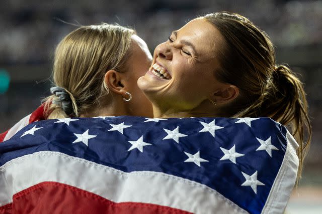 <p>Tim Clayton/Corbis via Getty </p> From left: Katie Moon and Nina Kennedy