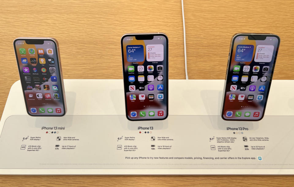 CORTE MADERA, CALIFORNIA - JANUARY 27:  New iPhone 13s are displayed at an Apple store on January 27, 2022 in Corte Madera, California. Apple reported record first-quarter earnings with $123.9 billion in overall revenue and $34.6 billion in profit. (Photo by Justin Sullivan/Getty Images)