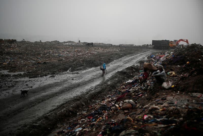 The Wider Image: "Fear will not fill our bellies": why Indian scavengers risk their lives amid coronavirus debris