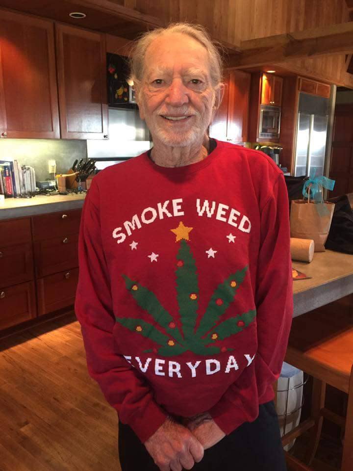 Willie Nelson showing off his gift from Snoop Dogg. (Photo: Facebook)