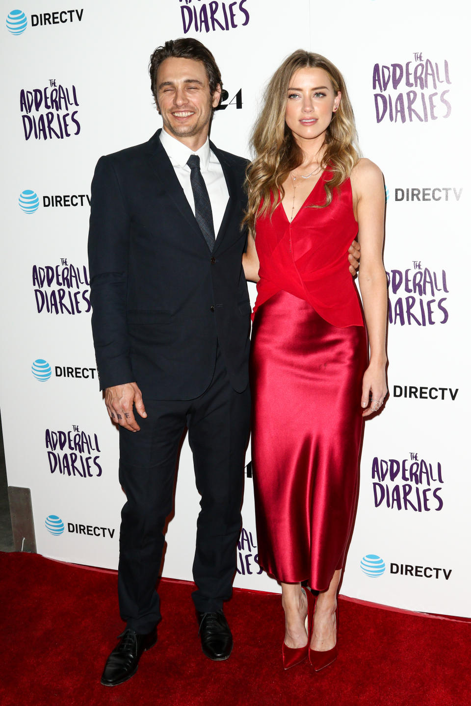 James Franco, left, and Amber Heard attend the LA Premiere of "The Adderall Diaries" held at ArcLight Hollywood on Tuesday, April 12, 2016, in Los Angeles. (Photo by John Salangsang/Invision/AP)