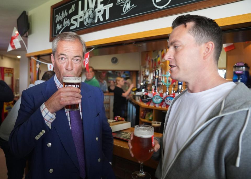 James McMurdock (R) with Mr Farage (Joe Giddens/PA Wire)