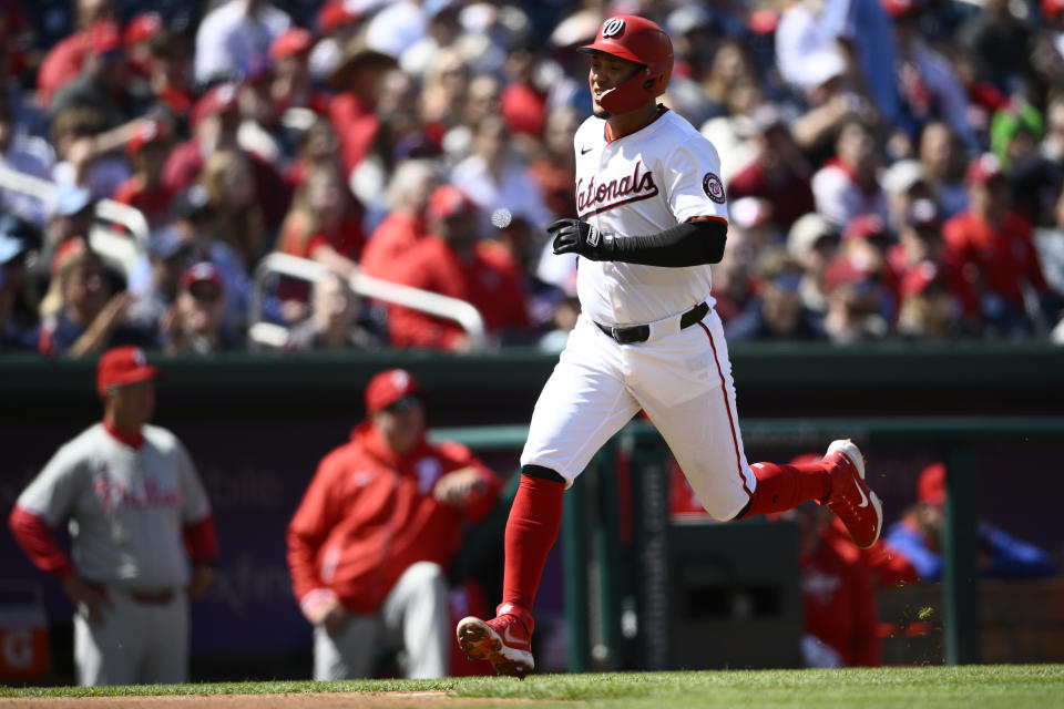 Washington Nationals' Ildemaro Vargas runs towards home to score on a single by Luis García Jr. during the second inning of a baseball game against the Philadelphia Phillies, Sunday, April 7, 2024, in Washington. (AP Photo/Nick Wass)