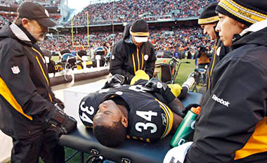 Steelers RB Rashard Mendenhall is examined during Sunday's win