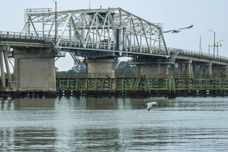 Sea gulls fly in front of the Richard V. Woods Memorial Bridge as pictured on Dec. 5, 2022, the last remaining swing bridge in Beaufort County.