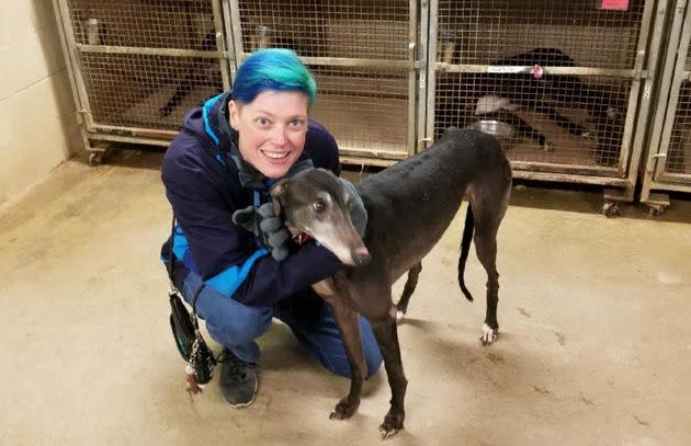 The author with her greyhound Juniper. “My veterinary background was a boon to the rescue organizations I encountered, reassuring them I could provide proper care for the animals I adopted,” the author writes. “This included Juniper, who had hypothyroidism and a Grade III heart murmur. This photo was taken in November 2018 at Project Racing Home in Randleman, North Carolina, the greyhound rescue where we adopted Juniper.” (Photo: Courtesy of Andria Kennedy)