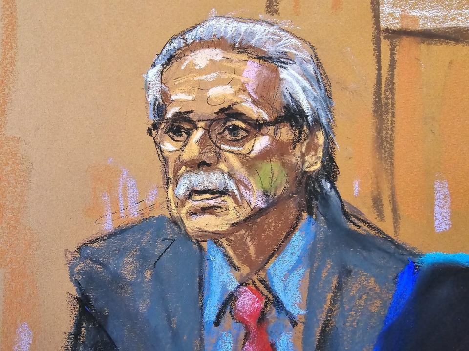 A court artist's sketch of David Pecker speaking in court and wearing a suit and tie.